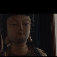 Buddha near seating at The Natural Cafe - Hitchcock Way in Santa Barbara