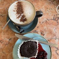 cappuccino and vegan chocolate cake  at Saudade in Sintra