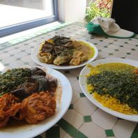 Table full of vegan dishes at Afghan-Eck in Freiburg