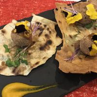 Lentil croquettes on Sardinian bread at Dolmen Bar in Lanzarote