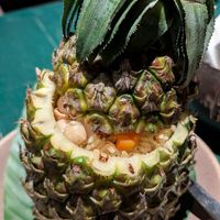 Macadamia fried rice in a pineapple at Uu Dam Chay in Hanoi