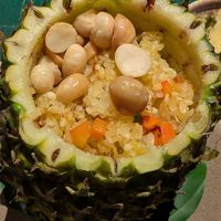 Macadamia fried rice in a pineapple at Uu Dam Chay in Hanoi