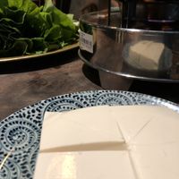 Fresh tofu going with the mushroom hot pot.  at Uu Dam Chay in Hanoi