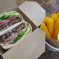 Yummy black bean burger with polenta chips at gud in Altrincham