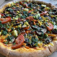 Veg Supremo with vegan cheese and vegan pesto  at Perfect Pizza in Bellingen