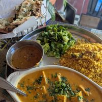 Tofu masala with extra garlic naan bread 🤤 at The Taj Cafe in Ventura