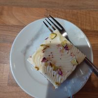 Carrot cake (the thick layer of cream cheese icing   at 3 Three's Coffee Lounge in Birmingham