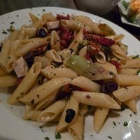 Vegan penne pasta with tofu, portobello mushrooms, kalamata olives, sun dried tomatoes, artichokes, and lemon oregano dressing. at Sarah Street Grill in Stroudsburg
