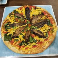 Portobello mushroom pizza with vegan cheese at Cafe Soleil in Springdale
