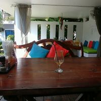 outside seating with pool view at Greenlight Cafe & Bar in Koh Samui