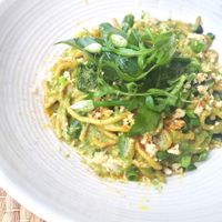Green pasta with pesto , vegan mozzarella and vegan parmesan yummy at Greenlight Cafe & Bar in Koh Samui