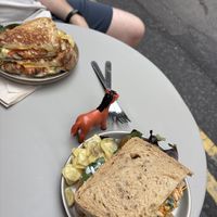 Chaat sandwich for me, vegan toasty #2 for my partner. Cute little animals for table numbers!  at Shed in Reading