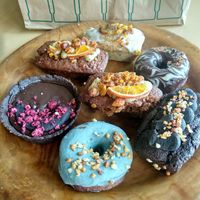 Chocolate tart, donuts, brownies, banana bread, lemon poppy seed loaf.  at Green&Berry in Barcelona