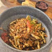 Authentic Greek pasta with vegan chicken, mushroom & black truffle at Yard of Taste in Zakynthos