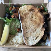 Vegan plate with toast  at Sol Natural Foods in Darra