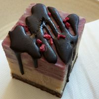 White choc & raspberry raw vegan slice at Piggy Back Cafe in Jindalee