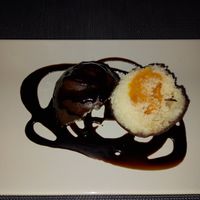 Vegan chocolate coated coconut sweet with apricot centre at Land of Freedom in Fuerteventura