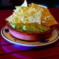 Nachos guacamole at Green Iguana Bar in Malaga