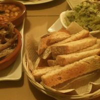 Tapas and Guacamole dip with nachos at Green Iguana Bar in Malaga