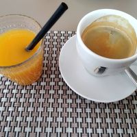 Coffee and orange juice (shame about the straw!) at Me Gusta in Mallorca