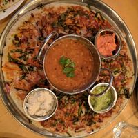 Uttapam - pancake bread sort of dish full of vegetables at Dosa Bar in Tel Aviv