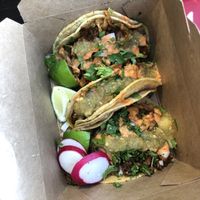 Three tacos with different fillings - all delicious  at Taqueria La Venganza in Oakland