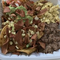 Chilaquiles + bacon  at Taqueria La Venganza in Oakland