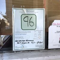 Food safety inspection rating posted in front window at New Eritrea in San Francisco
