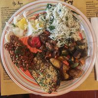 random plate! Doesn’t look really appetizing because I’m a very messy eater but everything was incredibly delicious! Lentils in a tomato-wine(?) sauce, baked breaded eggplant, roasted baby potatoes, caponata (veggies), mushrooms, basmati rice with broccoli, zucchini and herbs and a fennel salad. 
You can serve as much as you want... I recommend checking the buffet often at Orto in Rome