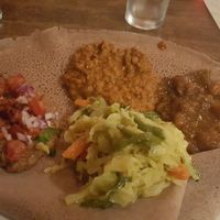 Vegan sampler with injera. at Teff in Stamford