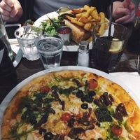 Neopolitan pizza and kebab, chips and salad on the far side at Janine Loves Sunday in Paris