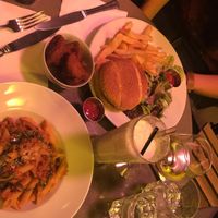 the vegan cheese burger, the penne Bolognese, chick'n nuggets and a pina colada!!!! all vegan and all amazing!!! the mock meats are incredible here at Janine Loves Sunday in Paris