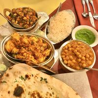 Aloo Gobhi, Bhindi Masala (Okra), Chana Masala, Garlic Naan. Delicious! at Delhi Palace in Flagstaff