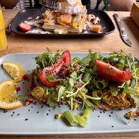 Waffle with fresh fruit; Oderberger Straße (scrambled tofu on bread)  at Cafe Neue Liebe in Berlin