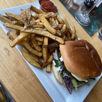 Crab cake sandwich with fries  at Leaf Vegetarian Restaurant in Boulder