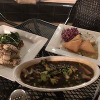 Feasting! BBQ tempeh with dill potato salad, curry tofu, udon rice w/ veggies at Leaf Vegetarian Restaurant in Boulder