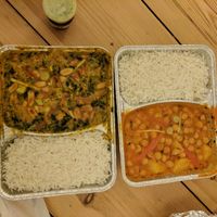 Takeout of Vegan Chicken Saag Badam (left) & Chole Alu (right) at Krishna in Berlin
