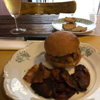 Red lentil burger with red pepper (capsicum) sauce and smokey potatoes. Yuuum. So much flavour. at Le Golose Imperfezioni in Como