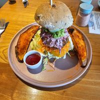 Burger with baked sweet potato at Earthlings in Bolton