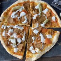 Vegan kebab pizza with vegan garlic sauce and a side of fries 🍟   at Kroppkärrs Pizzeria in Karlstad