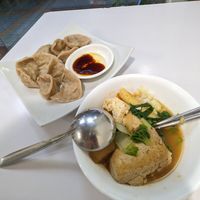 Sides of stinky tofu and dumplings at Brother Su Vegan Kitchen in New Taipei City