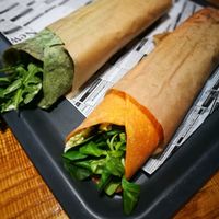 two tortia: one's a spinach tortia with fried tofu; the other's with seitan shewarma  at Farma Burgerownia Roslinna in Krakow