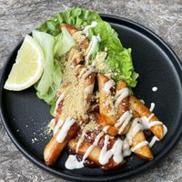 Yummy Korean Rice cakes - unusual but ohh so delish !  at Greenhouse Canteen & Bar in Tallebudgera-vallley