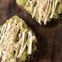 Avocado toast with tahini and almonds  at Pum Pum Cafe in Madrid