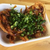 Frying saucers at Dharma Sushi & Thai in Boise