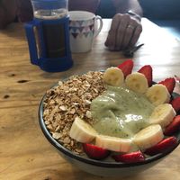 Green smoothie bowl and fresh coffee at Cafe Vida in La Paz