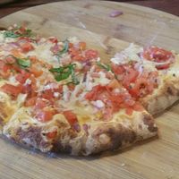 Vegan bruschetta pizza at CassellBella's Bakery Cafe in Northcote