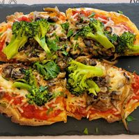 Pinsa: tomato sauce, vegan mozzarella, mushroom and broccoli 🔥 at ONO in Rhodes