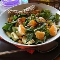 delicious salad with lettuce, corn,oranges, arugula, avocado, sesame and sunflower seeds  at ONO by Marouli in Rhodes