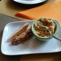 humus with toasted bread sticks :) sorry I already ate some of it before taking the picture  at ONO by Marouli in Rhodes